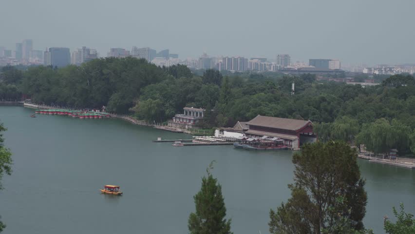 Beijing, China - june 2 2025 China traditional tourist boats on Beijing canals of Qianhai lake at ShiChaHai district 