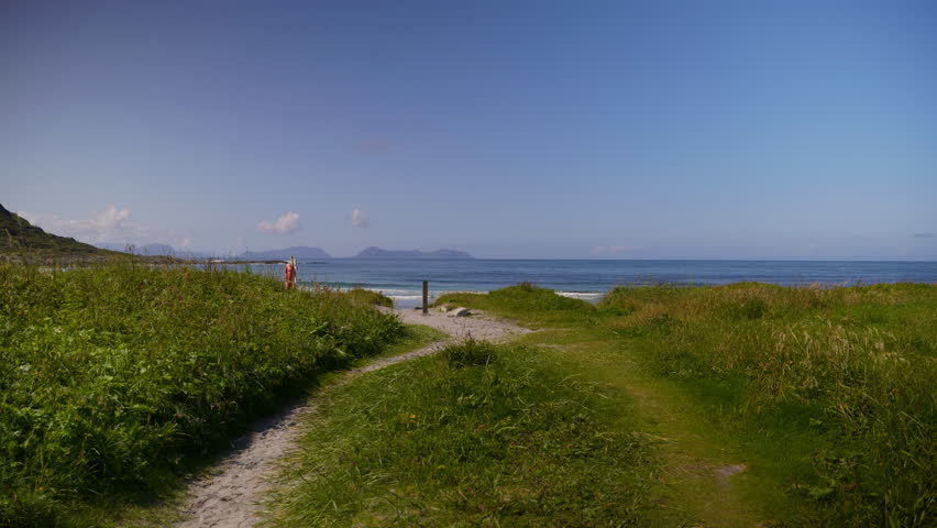 Landscape shot of an entrance to the beach in Alnes, Norway