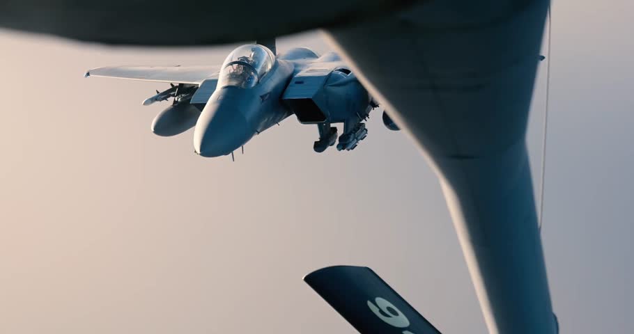 U.S. Air Force F-15E Strike Eagles are refueled by a KC-135 Stratotanker