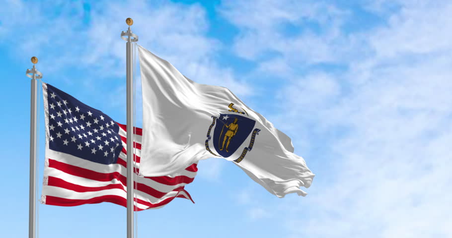 Flags of Massachusetts and the United States waving in the wind on a clear day. Patriotism and identity concept. Seamless 3d render animation. Slow motion loop. Selective focus