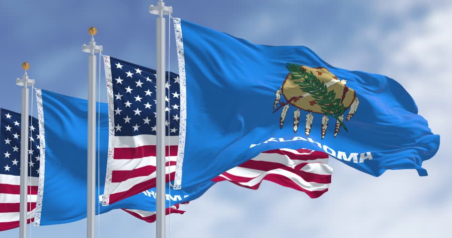 Oklahoma state flags waving the american national flags. Oklahoma is a state in the South Central region of the United States. Seamless 3d render animation. Slow motion loop. Selective focus