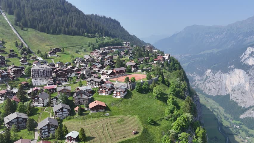 Panning drone aerial Stunning Mountain Village Murren Switzerland