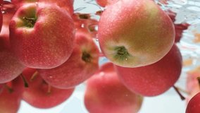Floating Red Apples Underwater. Minimal Aesthetic Motion. - Powered by Shutterstock - Get 15% off with code: PIKWIZARD15