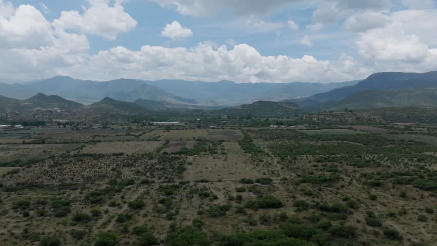DRONE SHOT OF FIELDS OF OAXACA AT A CLOUDY DAY