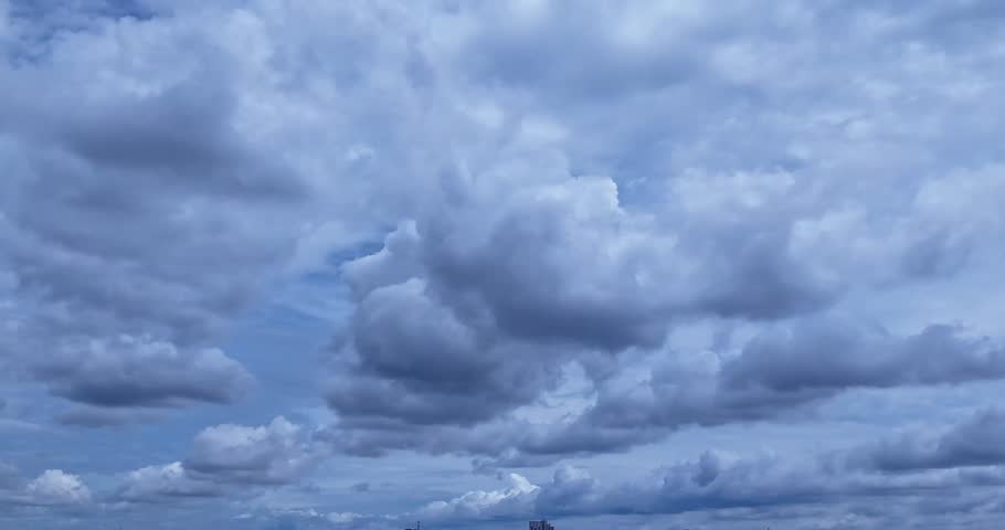 Time-lapse video of layered clouds moving like watercolor across the sky. A reflective, ambient mood invites viewers into a calm visual journey beyond the horizon. 