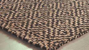 Camera sweeps over patterned rug resting on polished wood boards - Powered by Shutterstock - Get 15% off with code: PIKWIZARD15