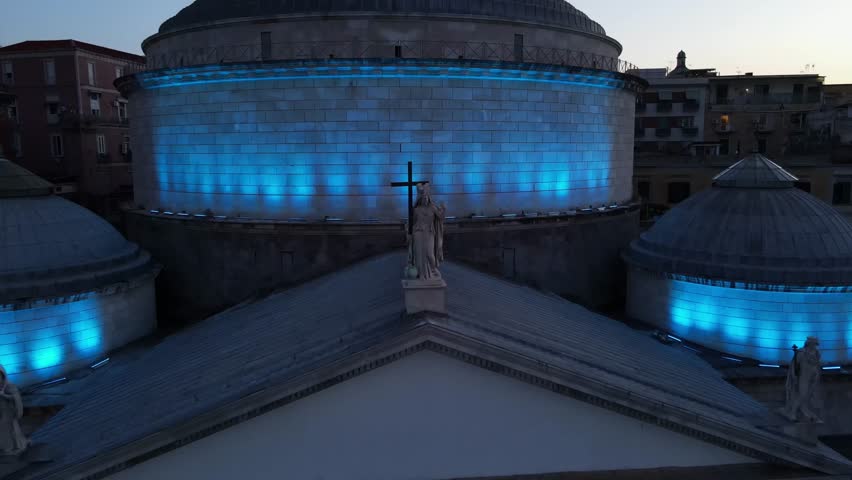 Aerial view of Piazza del Plebiscito in Naples, Italy, at night, illuminated central square in Naples, famous tourist destination in southern Italy. High quality 4k