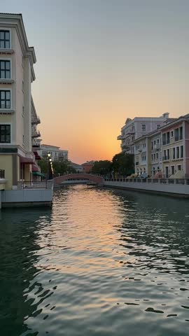 A city submerged halfway in water due to rising sea levels