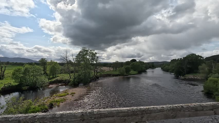 Scotland – June 1st 2025: Riversides of the Spey with flowing water, shingle banks, lush woodland, wildlife activity, and serene Highland scenery.