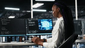 Data center female programmer using machine learning algorithms to analyze datasets. African american woman in server farm using AI neural networks to recognize data patterns, camera A - Powered by Shutterstock - Get 15% off with code: PIKWIZARD15