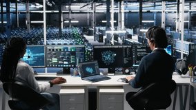 Data center system administrator using AI assistant to provide user technical support. Server room IT specialist managing live support calls assisted by artificial intelligence LLM, camera A - Powered by Shutterstock - Get 15% off with code: PIKWIZARD15