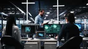 Server hub engineers alarmed by cyberattack accessing confidential data, working to secure systems. Teamworking data center colleagues fighting malware intrusion during security breach, camera A - Powered by Shutterstock - Get 15% off with code: PIKWIZARD15