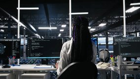 Female programmer in data center reviews AI diagnostics, analyzing neural network performance. Server hub IT expert optimizes artificial intelligence systems configuration, camera A - Powered by Shutterstock - Get 15% off with code: PIKWIZARD15