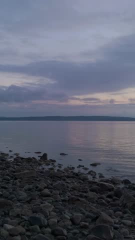 Calm Serene Waters of a Lake Shoreline in Beautiful British Columbia, Canada at Twilight