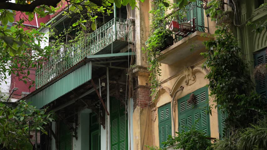 Colonial era building exterior Hanoi Vietnam Old Quarter neighbourhood facade