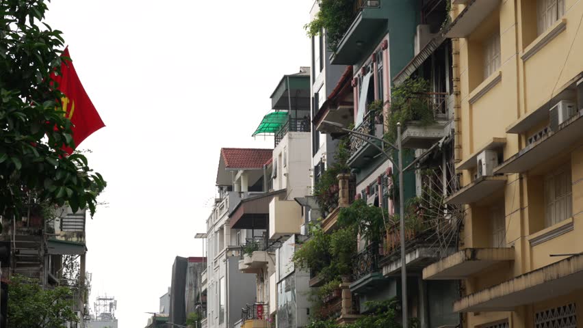 Vietnam communist national flag country local residents neighbourhood Hanoi homes real estate