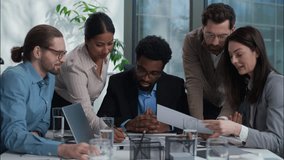 Diversity businesswomen businessmen Caucasian African Indian men women talk discussion project smiling in office business plan strategy together teamwork coworkers colleagues analyzing graph briefing - Powered by Shutterstock - Get 15% off with code: PIKWIZARD15