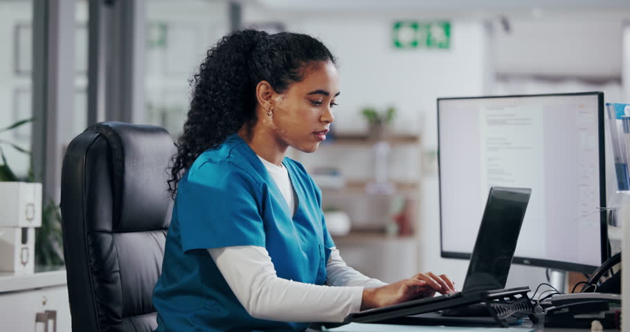 Nurse, woman or typing on laptop at reception to schedule appointment, health report or test results. Medicine, professional and computer screen for hospital administration or review medical database