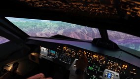 Inside the cockpit of an Airbus A320 flying over mountains during flight operations, medium shot - Powered by Shutterstock - Get 15% off with code: PIKWIZARD15