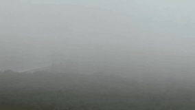 Early morning mist rolling over a shallow spring-fed pool in the forest.An aerial view of a lush, green forest with fog in a mountainous region, as seen in an image upload interface.  Timelapse green  - Powered by Shutterstock - Get 15% off with code: PIKWIZARD15
