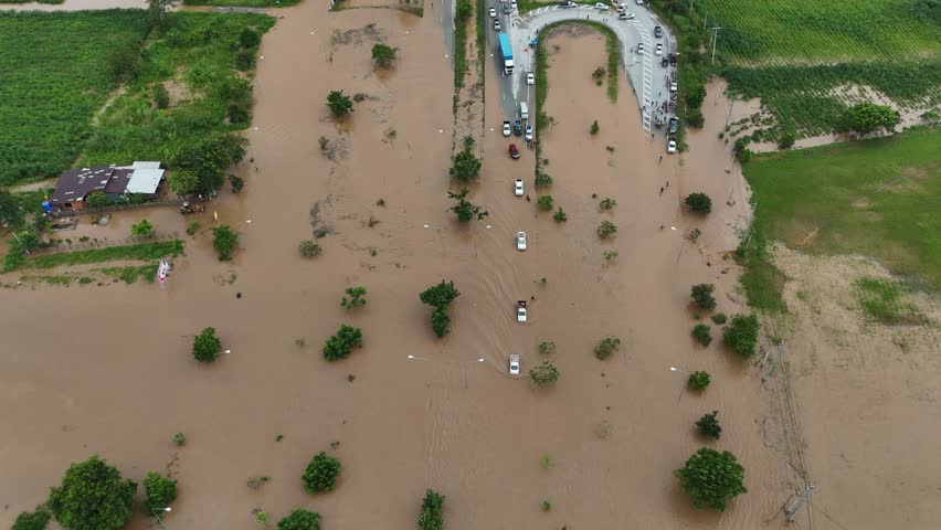 Aerial view of Chiang Rai downtown flooding by Kok river after heavy rain. This river is the blood line for people of Chiang Rai, started from the hills on boarder of Myanmar.