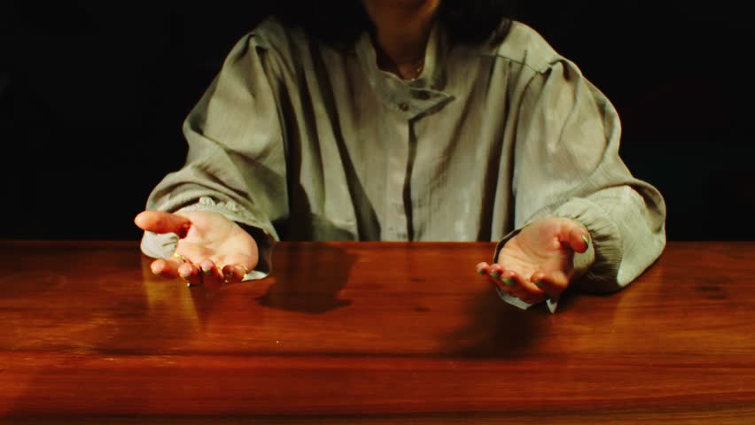 woman grabs the money while it rains money in slow motion