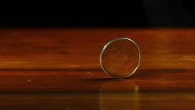 close up of one ounce maple leaf silver coin spins on the table in slow motion - Powered by Shutterstock - Get 15% off with code: PIKWIZARD15