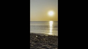  Sunrise at the seaside,summer vacation. Sea in the morning, Vertical video - Powered by Shutterstock - Get 15% off with code: PIKWIZARD15