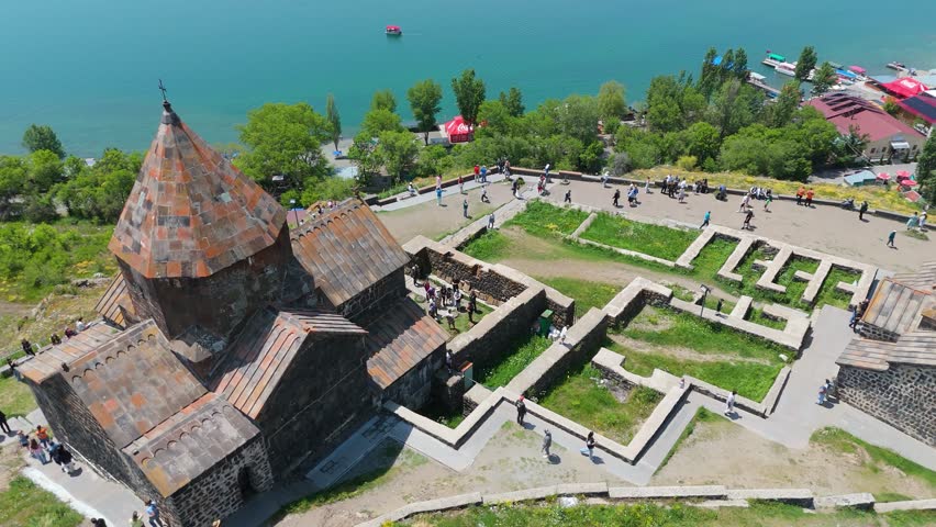 Aerial shot Sevanavanq near Sevan lake. Landscape of Lake Sevan, Gegharkunik Province, Armenia. Travel, touristic, adventure travel concept. Located in Akhtamar peninsula of Sevan lake.