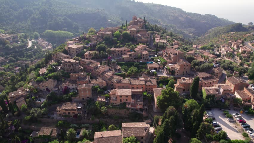 Aerial View of Deia Village in Mallorca on a Bright Sunny Morning 4k