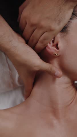 Neck Massage with Fingers near Ear and Shoulder