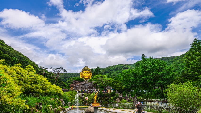 4K Time Lapse Video (Zoom Out) of Buddha Statue in Maravijaya Posture, Woljeongsa Temple in Summer and Beautiful Sky in South Korea, South Korea Landmarks, Korea Travel