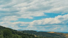 Nature landscape clouds rolling over hills and mountains time-lapse - Powered by Shutterstock - Get 15% off with code: PIKWIZARD15