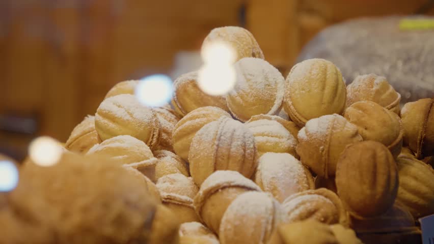 Experience the delight of traditional Romanian sweets at the Christmas market. Indulge in sugary treats that add joy to the holiday season with their unique flavors.