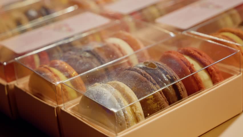 Experience the charm of a Christmas market in Romania, where a variety of traditional sweets and desserts tempt visitors with their festive flavors and colorful presentations.