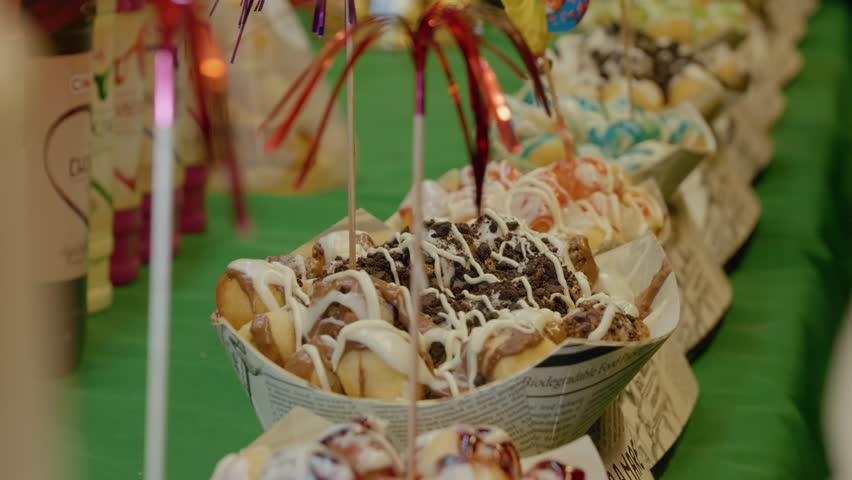 Discover a variety of delicious sweets and desserts at the Christmas market, featuring traditional Romanian treats perfect for the holiday season.