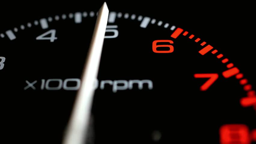 Closeup of a car tachometer showing high rpm for speed and performance