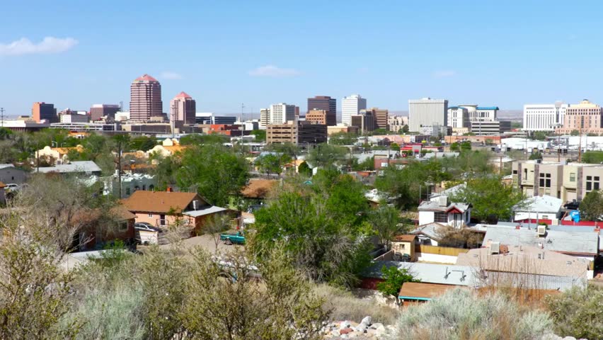 Albuquerque skyline with residential area in the foreground on a sunny day