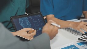 Medical team working on digital tablet healthcare doctor technology tablet using computer analyzed the results of medical reports. - Powered by Shutterstock - Get 15% off with code: PIKWIZARD15