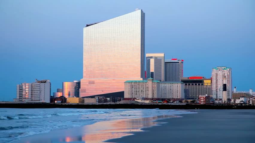 Atlantic city skyline at sunset reflecting on the ocean water