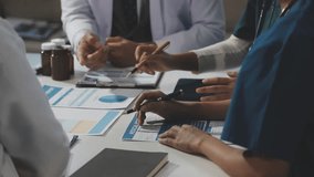 Medical team working on digital tablet healthcare doctor technology tablet using computer analyzed the results of medical reports. - Powered by Shutterstock - Get 15% off with code: PIKWIZARD15