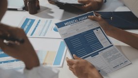 Medical team working on digital tablet healthcare doctor technology tablet using computer analyzed the results of medical reports. - Powered by Shutterstock - Get 15% off with code: PIKWIZARD15