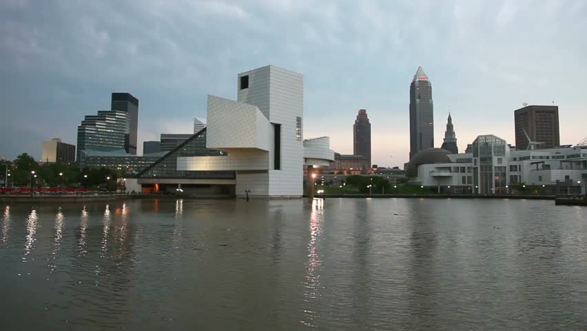 Cleveland skyline at night featuring the rock and roll hall of fame