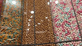 colorful candy sweet jelly in a glass jar displaying at candy shop  - Powered by Shutterstock - Get 15% off with code: PIKWIZARD15