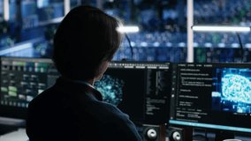 Data center system administrator working on artificial intelligence neural network software development. Server room IT specialist implementing machine learning technology in workplace, camera A - Powered by Shutterstock - Get 15% off with code: PIKWIZARD15