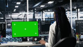 Female technician and coworker in data center review AI diagnostics on isolated screen PC. IT expert and colleague optimize artificial intelligence systems using chroma key computer, camera A - Powered by Shutterstock - Get 15% off with code: PIKWIZARD15