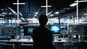 Data center engineer using computer to monitor neural network AI LLM visualization. IT professional using PC to oversee servers powering machine learning processes, camera A - Powered by Shutterstock - Get 15% off with code: PIKWIZARD15