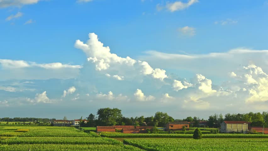 Rural Green Fields Landscape Under a Cloudy Sky,time-lapse photography
