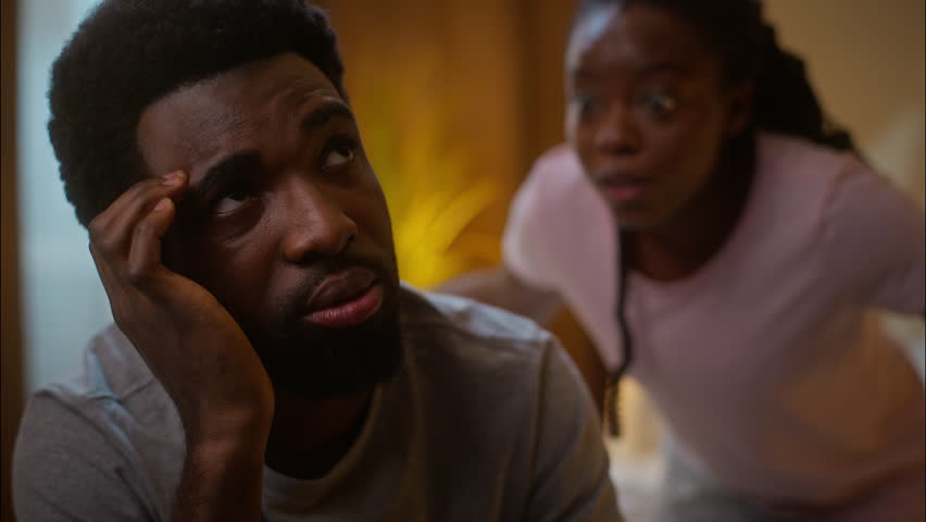 African American family fight crisis argument problem quarrel marriage couple divorce angry mad woman wife shouting yell scream sad guilty man husband cheating jealousy betrayal at home bedroom night