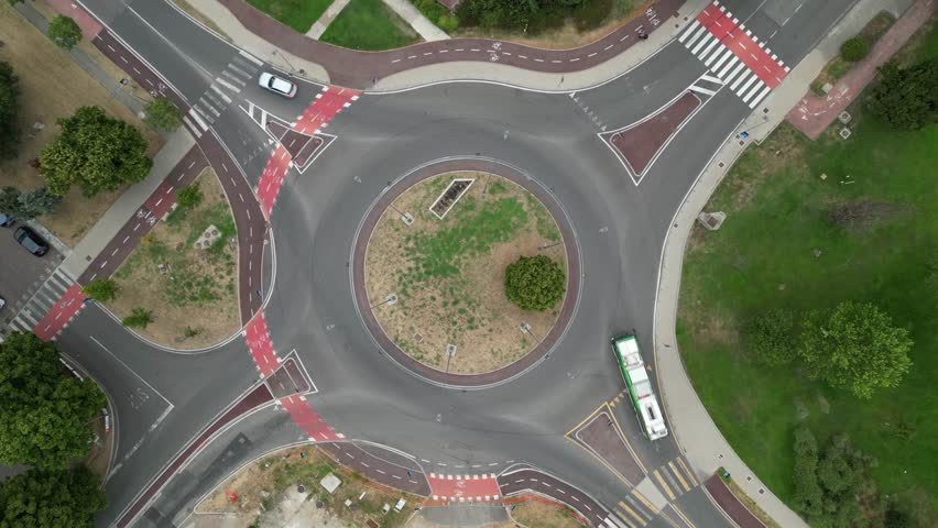 Daytime Overhead View of City Roundabout from Stationary Drone – Unedited Original Clip